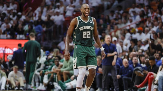 Milwaukee Bucks forward Khris Middleton (22) reacts in the second quarter against the Miami Heat